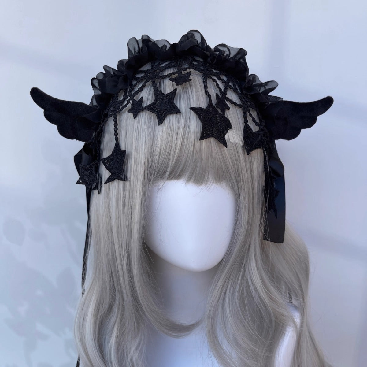 Design Concept：

This Gothic Lolita headband combines dark elegance with playful angelic charm. Crafted in both black and white, the accessory is designed to enhance Lolita, Y2K, and subculture styles. The collection features four distinct styles: two classic designs and two adorned with delicate angel wings, offering versatile options for cosplay, themed photoshoots, or daily Lolita fashion. Perfect for adding a touch of dramatic yet whimsical flair to any outfit.