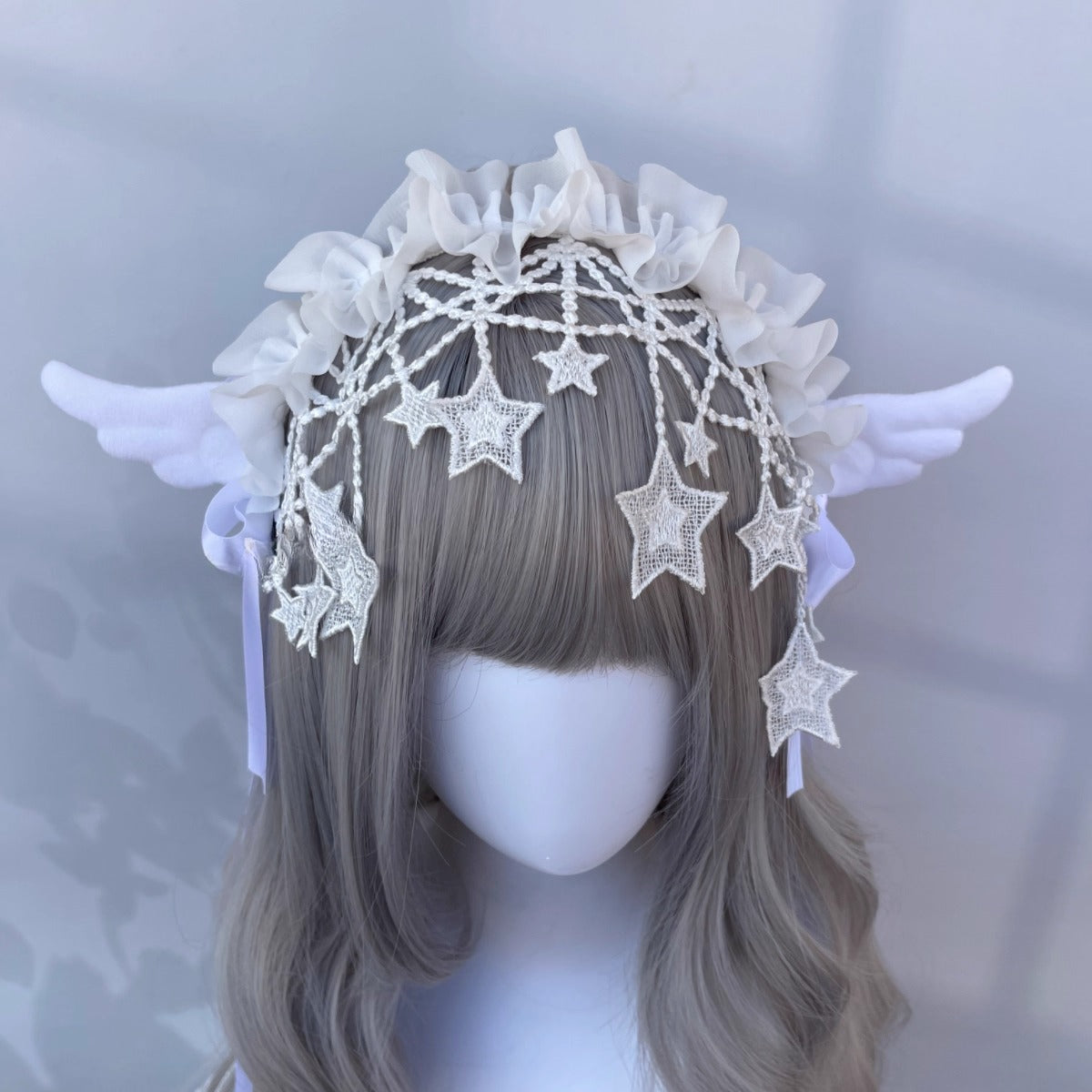 Design Concept：

This Gothic Lolita headband combines dark elegance with playful angelic charm. Crafted in both black and white, the accessory is designed to enhance Lolita, Y2K, and subculture styles. The collection features four distinct styles: two classic designs and two adorned with delicate angel wings, offering versatile options for cosplay, themed photoshoots, or daily Lolita fashion. Perfect for adding a touch of dramatic yet whimsical flair to any outfit.