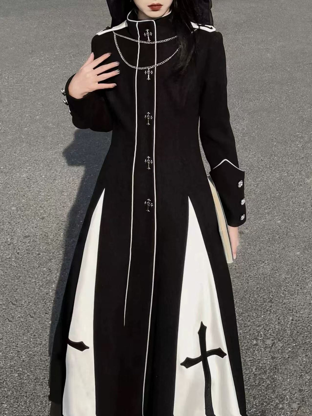 Design Concept:

This Gothic Lolita long dress in black features cross print detailing and a cut-out knit design, creating a striking and edgy aesthetic. The silhouette combines classic Gothic elegance with a modern Lolita twist, offering a long, flowing fit that exudes dramatic charm. Perfect for cosplay, themed events, or making a bold fashion statement, this dress captures the essence of dark, refined Lolita style.