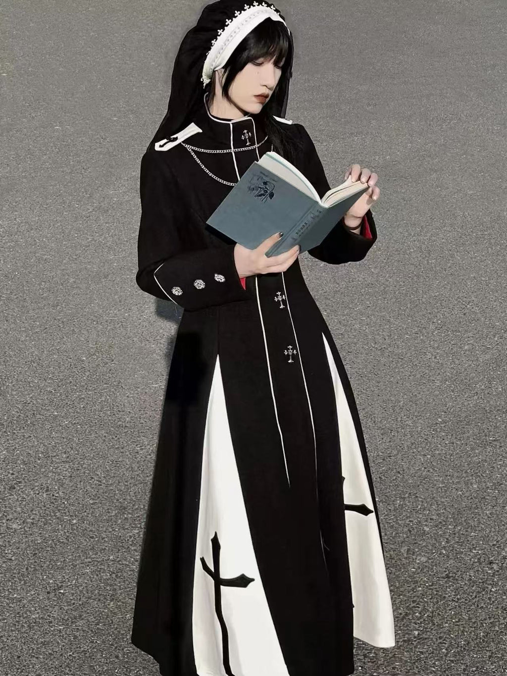 Design Concept:

This Gothic Lolita long dress in black features cross print detailing and a cut-out knit design, creating a striking and edgy aesthetic. The silhouette combines classic Gothic elegance with a modern Lolita twist, offering a long, flowing fit that exudes dramatic charm. Perfect for cosplay, themed events, or making a bold fashion statement, this dress captures the essence of dark, refined Lolita style.