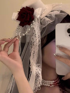 Design Concept:
This Gothic Lolita mini top hat exudes dark elegance with intricate lace overlays and refined detailing. Available in black and white, the hat is designed to complement both Gothic and Lolita fashion ensembles, making it perfect for cosplay, photoshoots, or themed parties. Its petite size allows it to sit delicately on the head, adding a dramatic yet cute accent to any outfit.