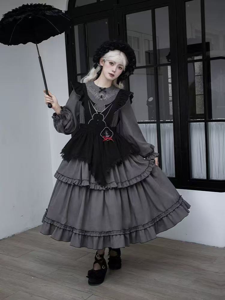 Design Concept:

This Gothic Lolita gray dress features a three-tier flared design with delicate embroidery, combining dramatic elegance with a refined gothic aesthetic. The soft gray tone adds a mysterious and sophisticated touch, perfect for creating a unique Lolita look. Product Details: The product includes one dress, designed to offer a striking and graceful outfit suitable for special occasions or themed fashion.