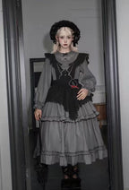 Design Concept:

This Gothic Lolita gray dress features a three-tier flared design with delicate embroidery, combining dramatic elegance with a refined gothic aesthetic. The soft gray tone adds a mysterious and sophisticated touch, perfect for creating a unique Lolita look. Product Details: The product includes one dress, designed to offer a striking and graceful outfit suitable for special occasions or themed fashion.