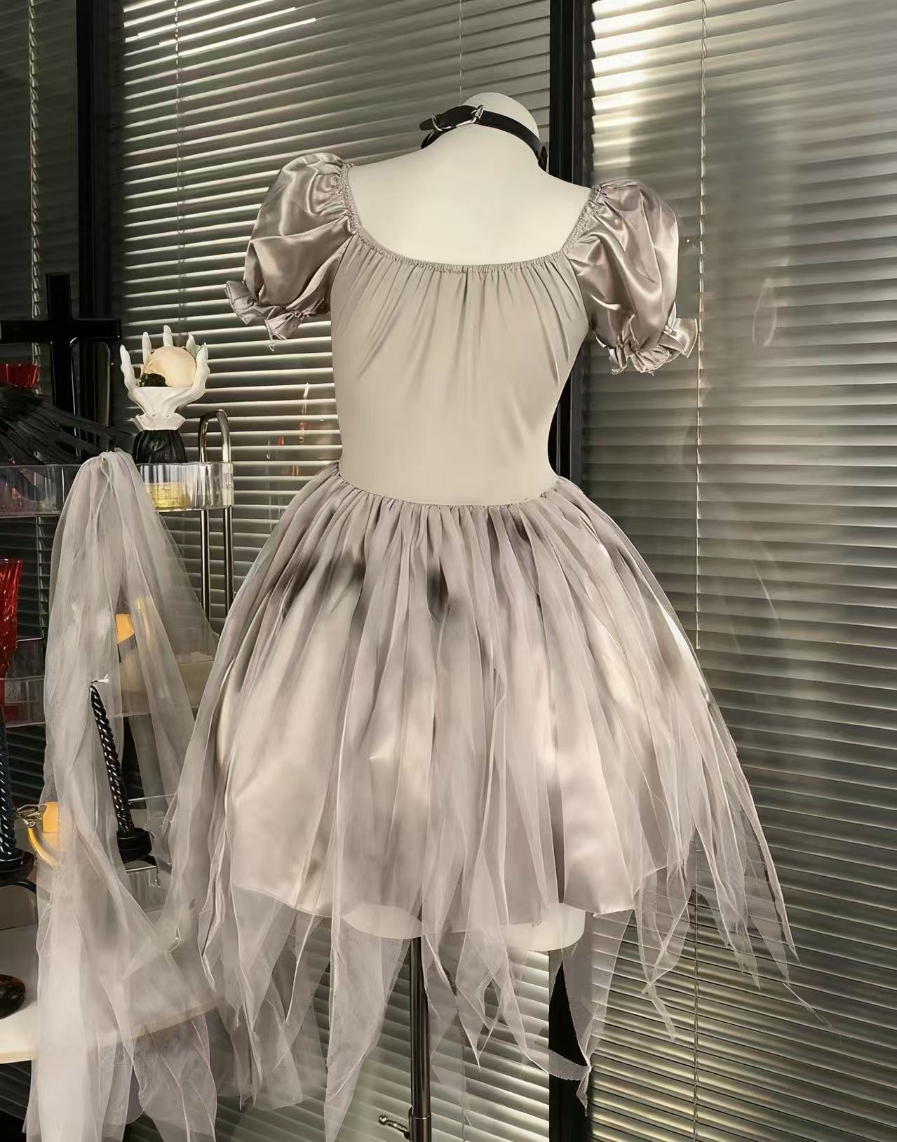 Design Concept:

This Gothic Lolita Halloween cosplay dress set presents a dark bride aesthetic in elegant gray tones, blending gothic style with a mysterious atmosphere. Product Details: The set includes one uniform-style dress only, without any accessories, making it suitable for Halloween cosplay or gothic themed occasions.
