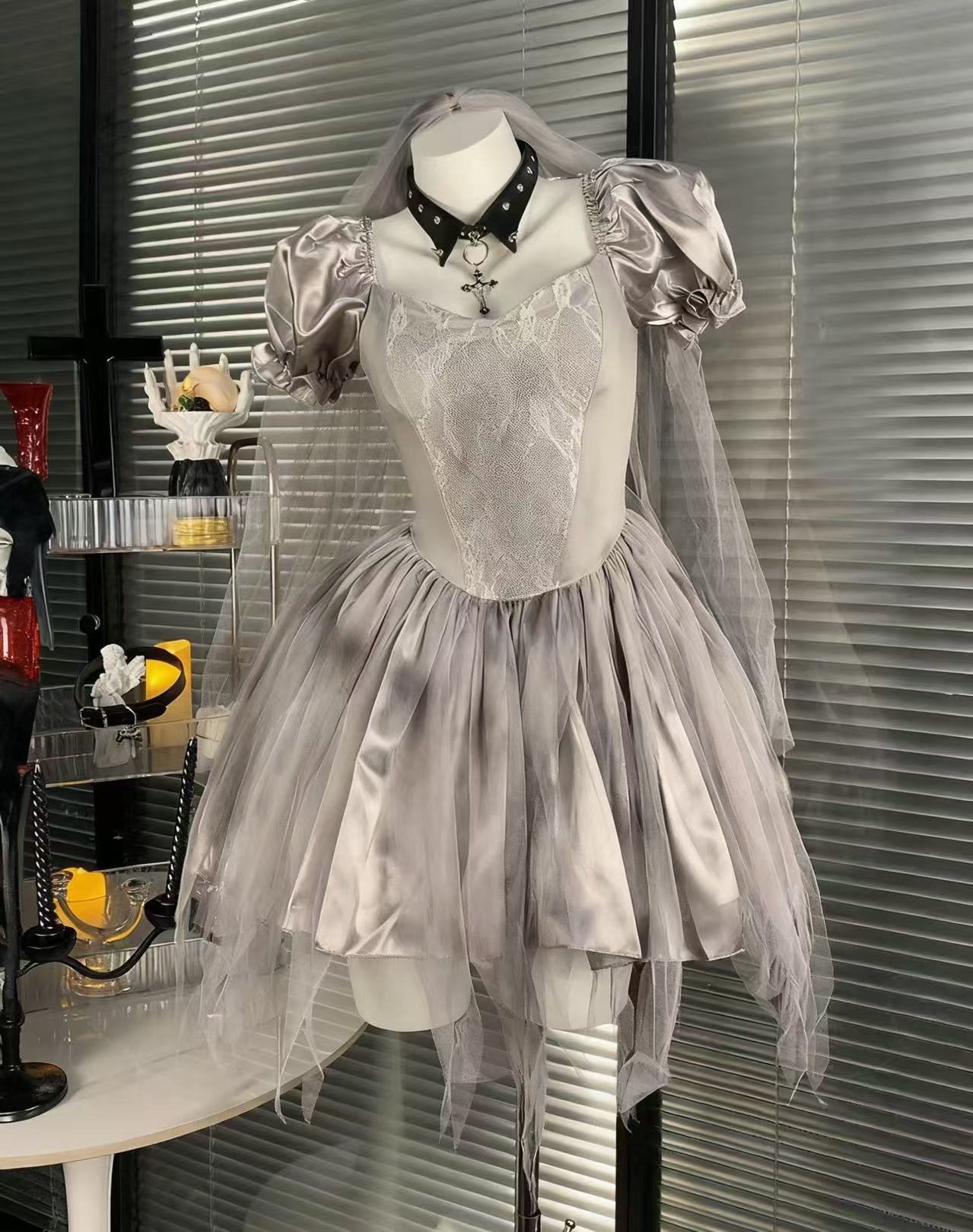 Design Concept:

This Gothic Lolita Halloween cosplay dress set presents a dark bride aesthetic in elegant gray tones, blending gothic style with a mysterious atmosphere. Product Details: The set includes one uniform-style dress only, without any accessories, making it suitable for Halloween cosplay or gothic themed occasions.