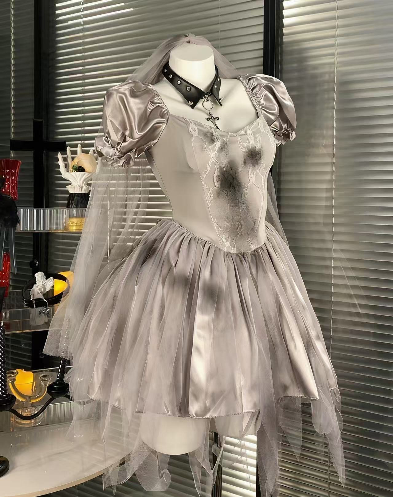 Design Concept:

This Gothic Lolita Halloween cosplay dress set presents a dark bride aesthetic in elegant gray tones, blending gothic style with a mysterious atmosphere. Product Details: The set includes one uniform-style dress only, without any accessories, making it suitable for Halloween cosplay or gothic themed occasions.