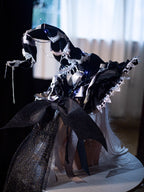 Design Concept:

This Gothic Lolita witch hat merges dark elegance with mystical charm. Available in black and white, the hat is handcrafted with intricate details, featuring a six-pointed star motif and a subtle skeleton-inspired structure for a dramatic effect. There are two distinct styles: one is a classic witch hat, and the other includes bat wings and an attached veil for an extra theatrical Gothic flair. Ideal for Halloween, cosplay, themed photoshoots, or adding a whimsical Gothic touch to Lolita fa