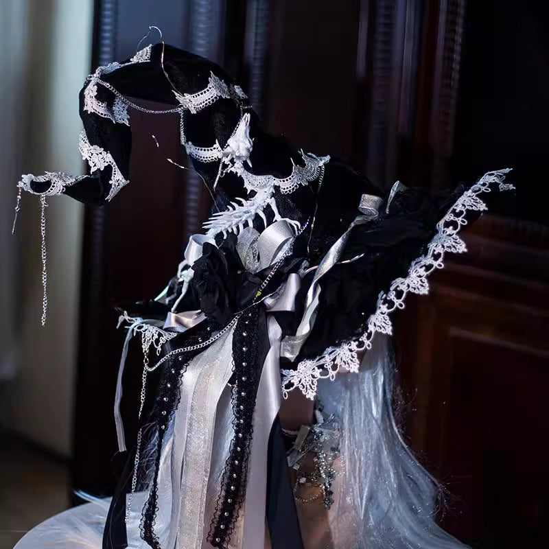 Design Concept:

This Gothic Lolita witch hat merges dark elegance with mystical charm. Available in black and white, the hat is handcrafted with intricate details, featuring a six-pointed star motif and a subtle skeleton-inspired structure for a dramatic effect. There are two distinct styles: one is a classic witch hat, and the other includes bat wings and an attached veil for an extra theatrical Gothic flair. Ideal for Halloween, cosplay, themed photoshoots, or adding a whimsical Gothic touch to Lolita fa