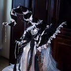 Design Concept:

This Gothic Lolita witch hat merges dark elegance with mystical charm. Available in black and white, the hat is handcrafted with intricate details, featuring a six-pointed star motif and a subtle skeleton-inspired structure for a dramatic effect. There are two distinct styles: one is a classic witch hat, and the other includes bat wings and an attached veil for an extra theatrical Gothic flair. Ideal for Halloween, cosplay, themed photoshoots, or adding a whimsical Gothic touch to Lolita fa