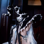 Design Concept:

This Gothic Lolita witch hat merges dark elegance with mystical charm. Available in black and white, the hat is handcrafted with intricate details, featuring a six-pointed star motif and a subtle skeleton-inspired structure for a dramatic effect. There are two distinct styles: one is a classic witch hat, and the other includes bat wings and an attached veil for an extra theatrical Gothic flair. Ideal for Halloween, cosplay, themed photoshoots, or adding a whimsical Gothic touch to Lolita fa