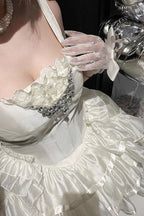 Design Concept:

This Hime Lolita JSK dress in classic white features a three-tier frill design adorned with ribbon and delicate lace details. The layered ruffles create a soft, elegant silhouette, perfectly capturing the sweet and charming princess aesthetic. Crafted with attention to detail, this dress combines a feminine look with a refined Lolita style. Ideal for special occasions, cosplay, or completing a sweet Lolita wardrobe, this JSK offers both elegance and timeless appeal.