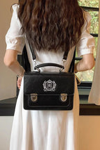 Design Concept:

This charming Lolita messenger bag blends playful Japanese school style with sweet, feminine details. Featuring a printed design and a classic messenger silhouette, it adds a stylish touch to any Lolita or casual outfit. Available in two sizes—large and small—the bag accommodates different carrying needs, while the sturdy handle ensures comfortable use. Choose from two versatile colors, black and brown, to match a variety of looks. Perfect for daily outings, school-inspired Lolita coordinat