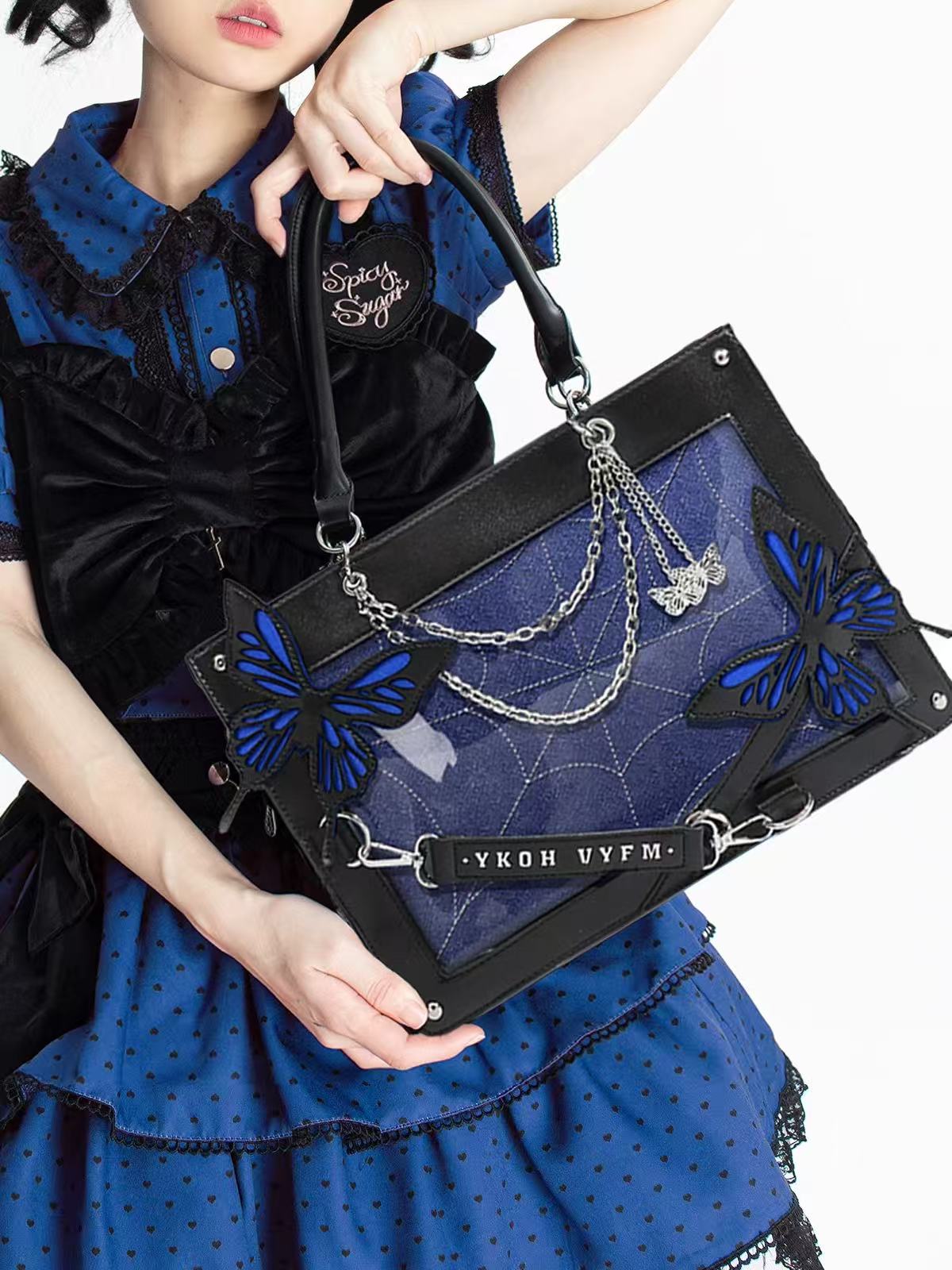 Design Concept:

This striking Lolita crossbody bag blends gothic elegance with whimsical charm. Featuring a maze and butterfly motif, it exudes a mysterious and playful aesthetic perfect for Gothic Lolita outfits. The compact design allows for easy carrying of essentials, while the adjustable strap ensures comfort and versatility. Available in seven captivating color combinations—Blue-Black, Black-Silver, White-Gold, Purple-Black, Red-Black, Green-Black, and Purple-White—this bag is ideal for completing bo