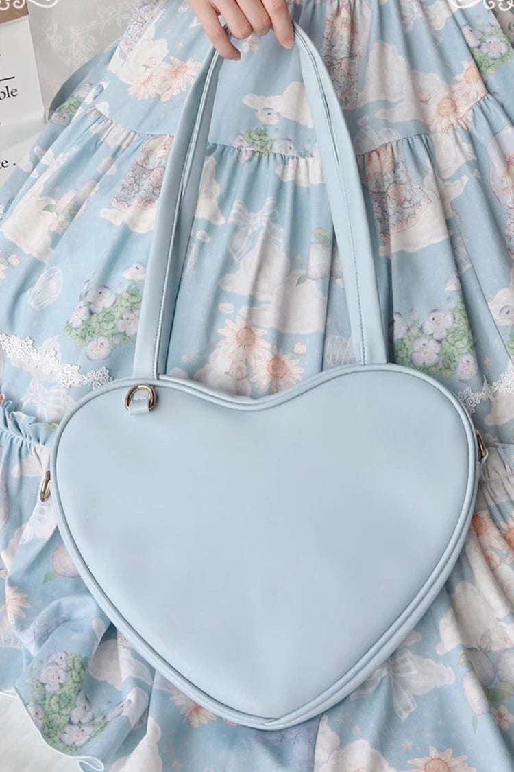 Design Concept:

This charming Lolita crossbody bag combines simplicity with sweet, playful charm. Crafted with a solid color design and a cute heart accent, it adds a touch of feminine elegance to any outfit. The compact size makes it perfect for carrying essentials, while the adjustable strap ensures comfortable wear. Available in four delightful colors—blue, white, pink, and yellow—this bag complements a variety of Lolita styles, making it ideal for daily wear, tea parties, or casual outings.