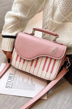 Design Concept:

This delightful Lolita crossbody bag combines musical charm with classic sweet style. Crafted with delicate piano note embroidery, it adds a whimsical and elegant touch to any outfit. The compact design makes it perfect for carrying essentials, while the adjustable strap ensures comfortable wear. Available in three versatile colors—black, pink, and brown—this bag complements a variety of Lolita coordinates, making it ideal for daily outings, music-themed events, or tea parties.