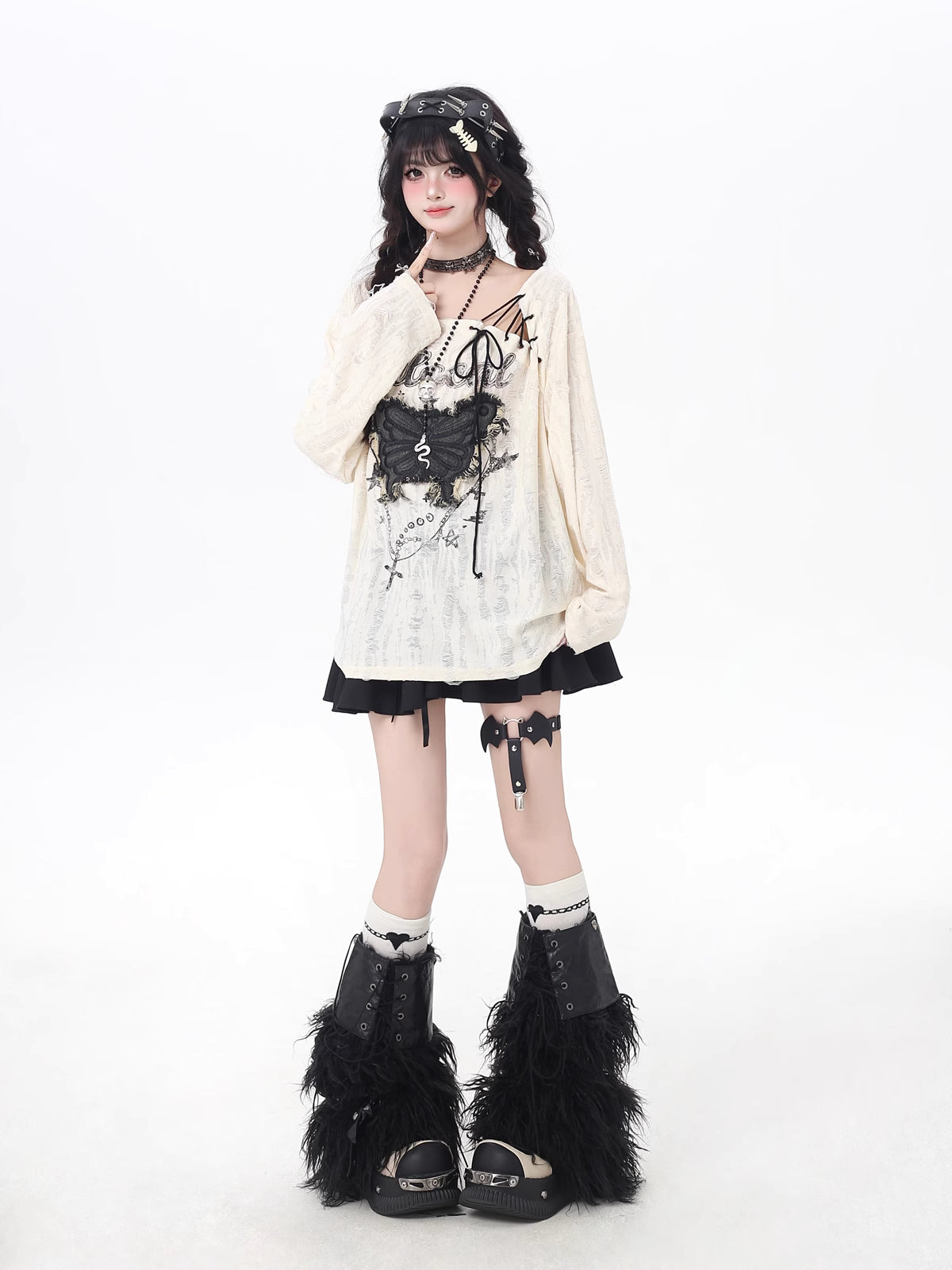 This apricot Lolita blouse blends retro sweetness with a touch of edgy design. Featuring delicate butterfly patch embellishments, distressed details, and lace-up accents, the piece captures both elegance and rebellious charm. The loose fit and long sleeves ensure a comfortable, effortless wear, perfect for early autumn layering. Ideal for casual outings or streetwear looks, this top adds a playful yet stylish twist to everyday fashion.