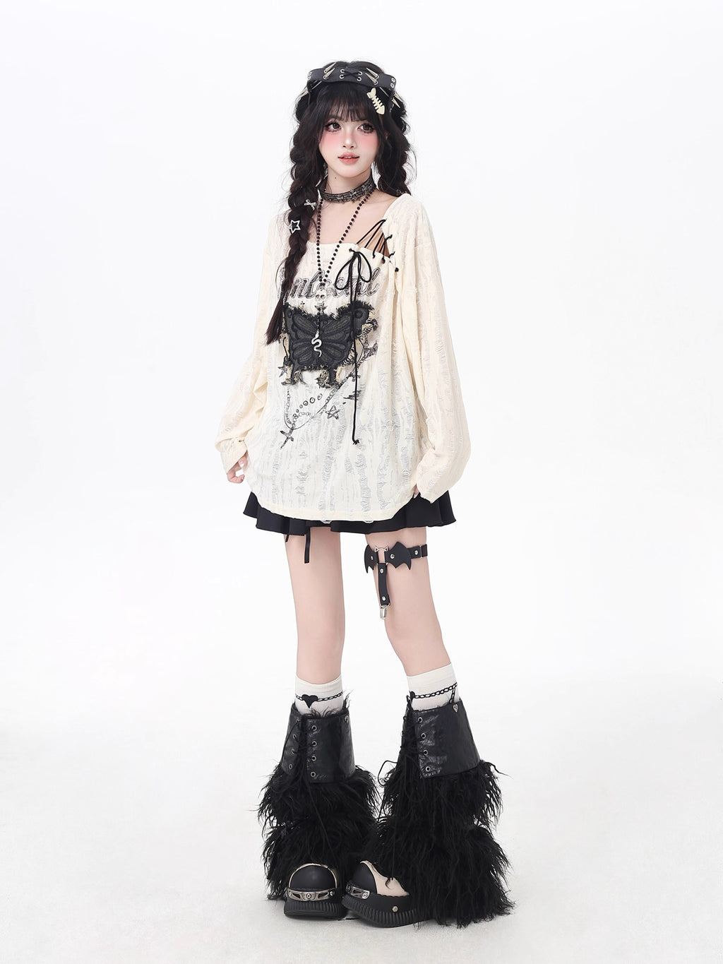 This apricot Lolita blouse blends retro sweetness with a touch of edgy design. Featuring delicate butterfly patch embellishments, distressed details, and lace-up accents, the piece captures both elegance and rebellious charm. The loose fit and long sleeves ensure a comfortable, effortless wear, perfect for early autumn layering. Ideal for casual outings or streetwear looks, this top adds a playful yet stylish twist to everyday fashion.