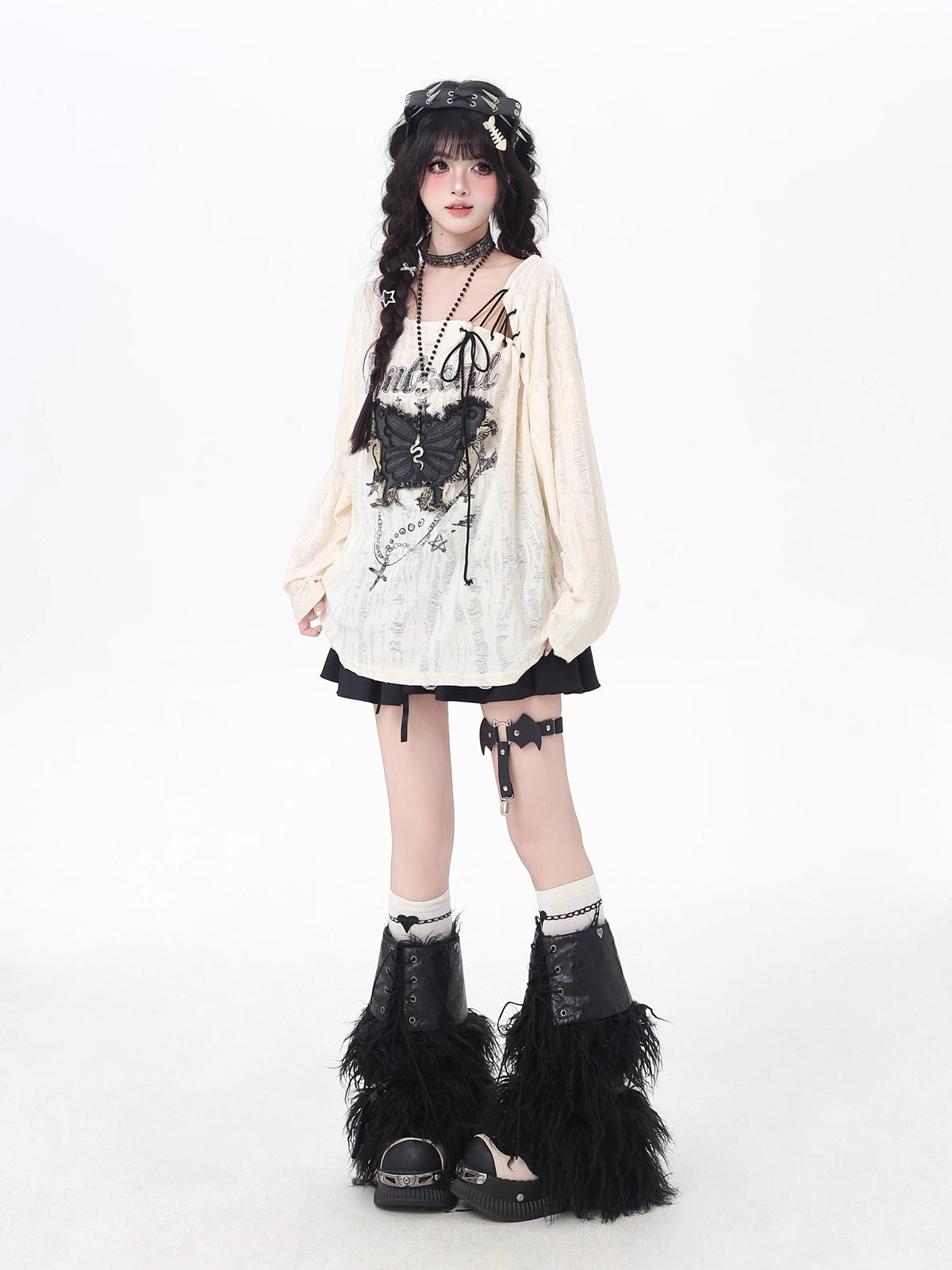 This apricot Lolita blouse blends retro sweetness with a touch of edgy design. Featuring delicate butterfly patch embellishments, distressed details, and lace-up accents, the piece captures both elegance and rebellious charm. The loose fit and long sleeves ensure a comfortable, effortless wear, perfect for early autumn layering. Ideal for casual outings or streetwear looks, this top adds a playful yet stylish twist to everyday fashion.