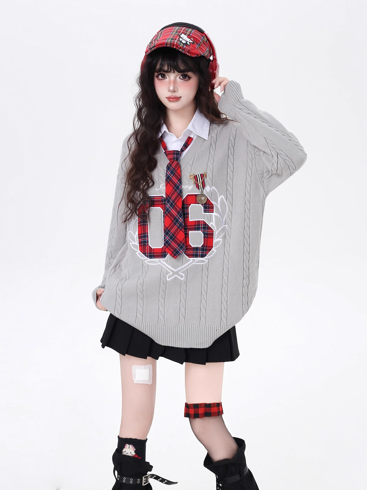 Design Concept:

This Lolita Blouses knit sweater combines classic collegiate charm with modern Sweet Lolita flair. Crafted in black and gray, the design features a two-layer faux-off-shoulder style with delicate embroidery along the neckline and cuffs. The loose fit ensures comfort for all-day wear, while the included tie adds a polished, school-inspired touch. Perfect for autumn casual outings, this sweater effortlessly blends cozy warmth with cute, playful style.