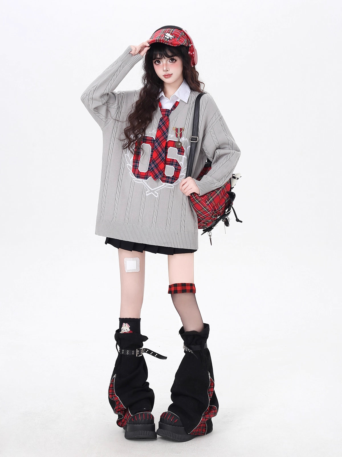 Design Concept:

This Lolita Blouses knit sweater combines classic collegiate charm with modern Sweet Lolita flair. Crafted in black and gray, the design features a two-layer faux-off-shoulder style with delicate embroidery along the neckline and cuffs. The loose fit ensures comfort for all-day wear, while the included tie adds a polished, school-inspired touch. Perfect for autumn casual outings, this sweater effortlessly blends cozy warmth with cute, playful style.