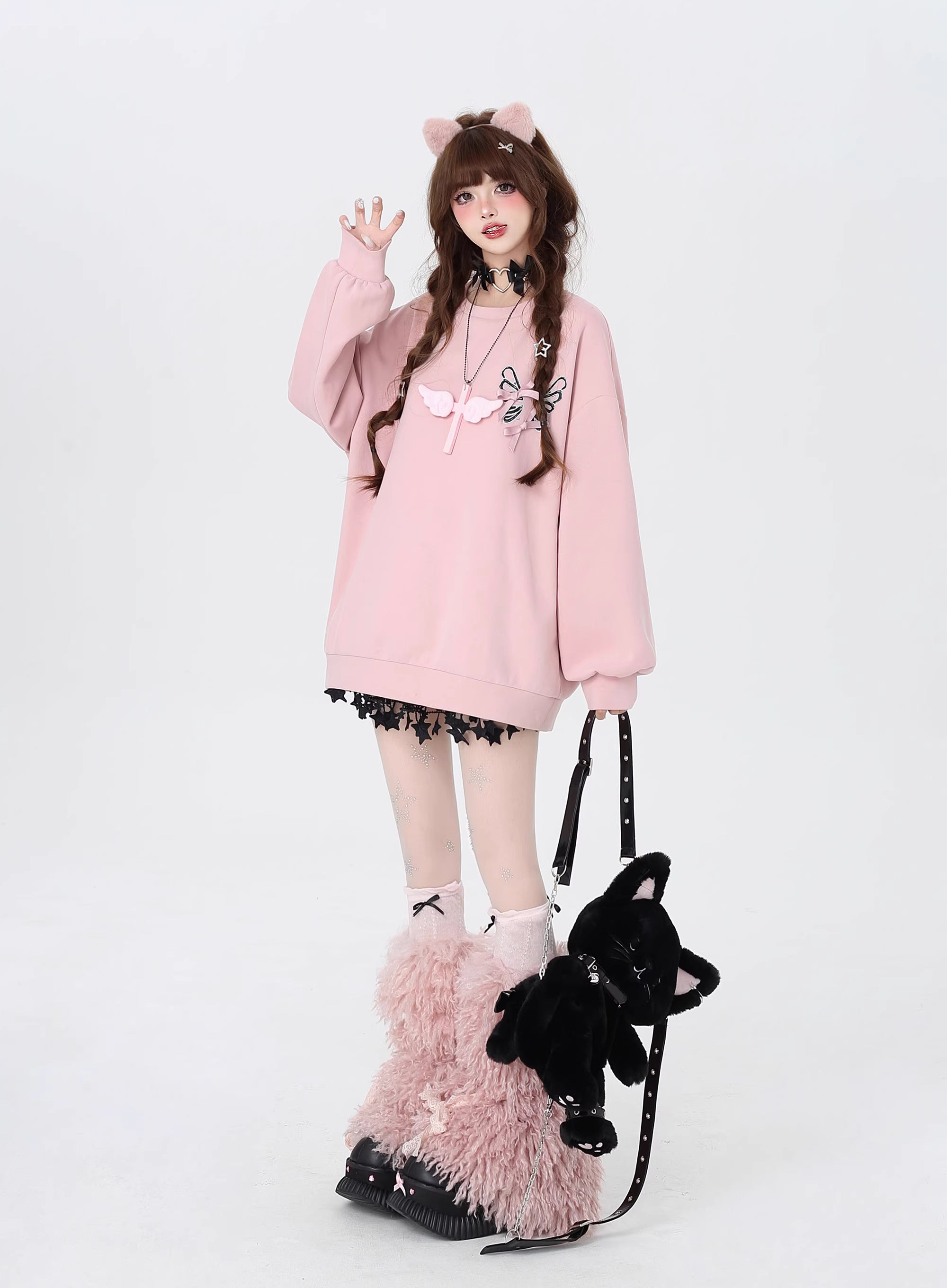This Lolita blouse-style crewneck sweatshirt comes in soft pink and classic black, blending sweet charm with a cool casual vibe. Designed with delicate bow tie-up details, it adds a playful and feminine touch while keeping a relaxed, loose fit that’s perfect for layering in autumn. Comfortable yet stylish, it’s ideal for casual outings, daily wear, or pairing with Lolita-inspired coordinates for a cozy seasonal look.