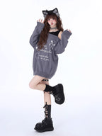 Design Concept:
This Lolita blouse comes in pink, black, and gray, blending sweet aesthetics with a touch of edgy street style. Designed with an off-shoulder cut and distressed details, it brings a playful yet bold charm to autumn and winter outfits. The two-layered fake design adds depth and a casual layering effect without extra bulk, while the soft knit fabric ensures warmth and comfort. Perfect for both daily wear and street fashion, this loose-fit sweater captures a youthful, carefree vibe with a subtl