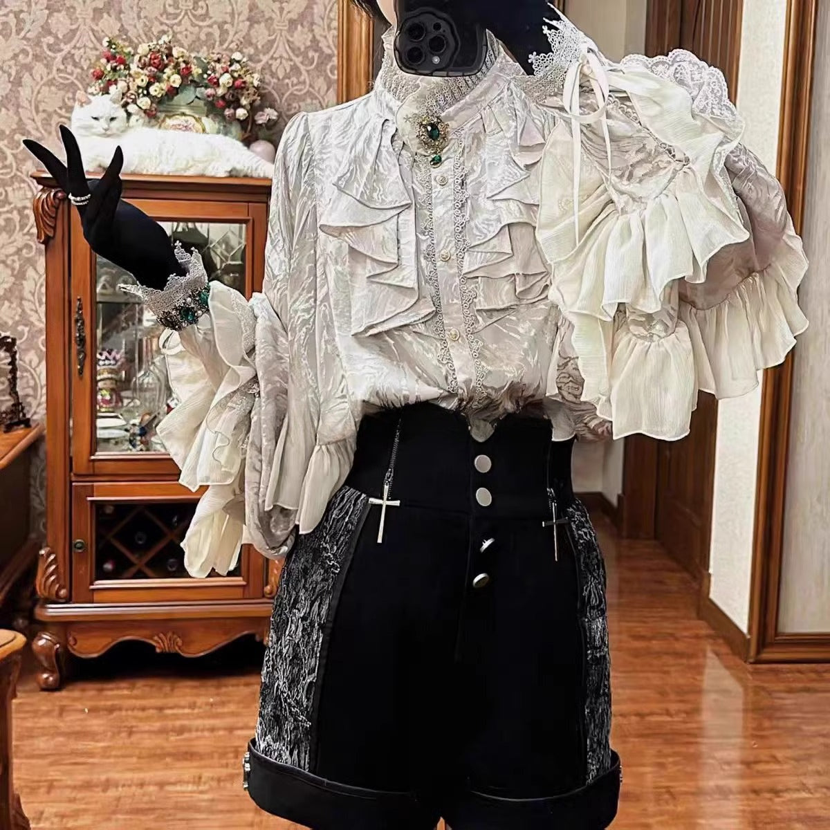 Design Concept:

This Lolita blouse features dramatic bat sleeves with a Gothic medieval charm, blending elegance and boldness in one piece. Available in red, white, apricot, black, and silver, it offers versatile styling for different moods and occasions. The soft yet structured fabric ensures comfort while maintaining a vintage silhouette, perfect for pairing with Lolita skirts, shorts, or layered coordinates. Whether for daily wear, themed gatherings, or cosplay events, this blouse adds a striking statem