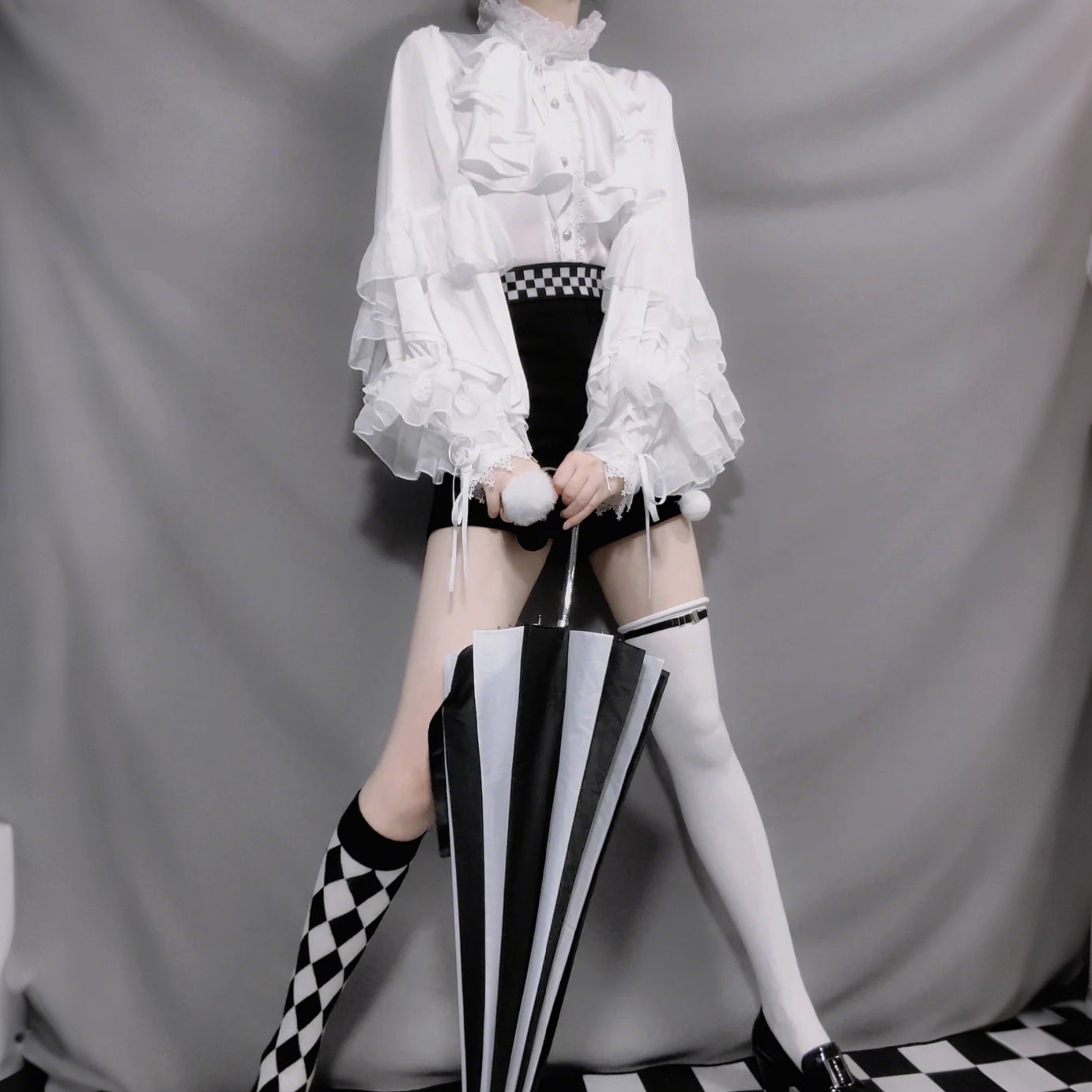 Design Concept:

This Lolita blouse features dramatic bat sleeves with a Gothic medieval charm, blending elegance and boldness in one piece. Available in red, white, apricot, black, and silver, it offers versatile styling for different moods and occasions. The soft yet structured fabric ensures comfort while maintaining a vintage silhouette, perfect for pairing with Lolita skirts, shorts, or layered coordinates. Whether for daily wear, themed gatherings, or cosplay events, this blouse adds a striking statem