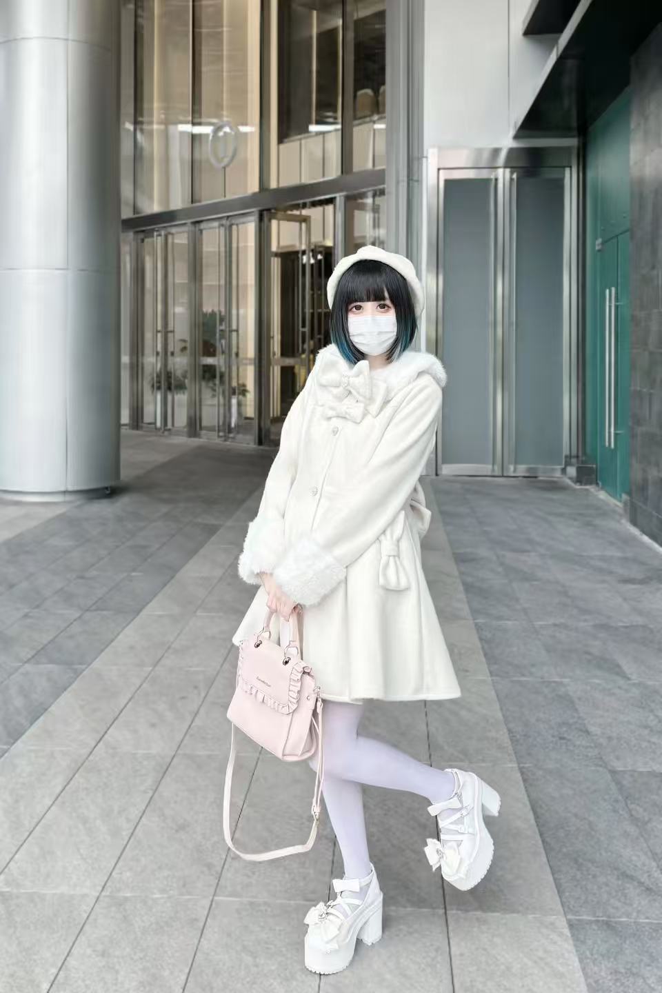 Design Concept:

This Lolita coat in classic black features a vintage Ouji-inspired design with oversized wide sleeves. Made from soft wool fabric, it offers both warmth and elegance for autumn and winter wear. The loose silhouette creates a graceful flow, while the retro details highlight a noble and stylish Lolita aesthetic. Perfect for pairing with dresses, skirts, or formal Lolita outfits, this overcoat combines comfort, functionality, and timeless charm.