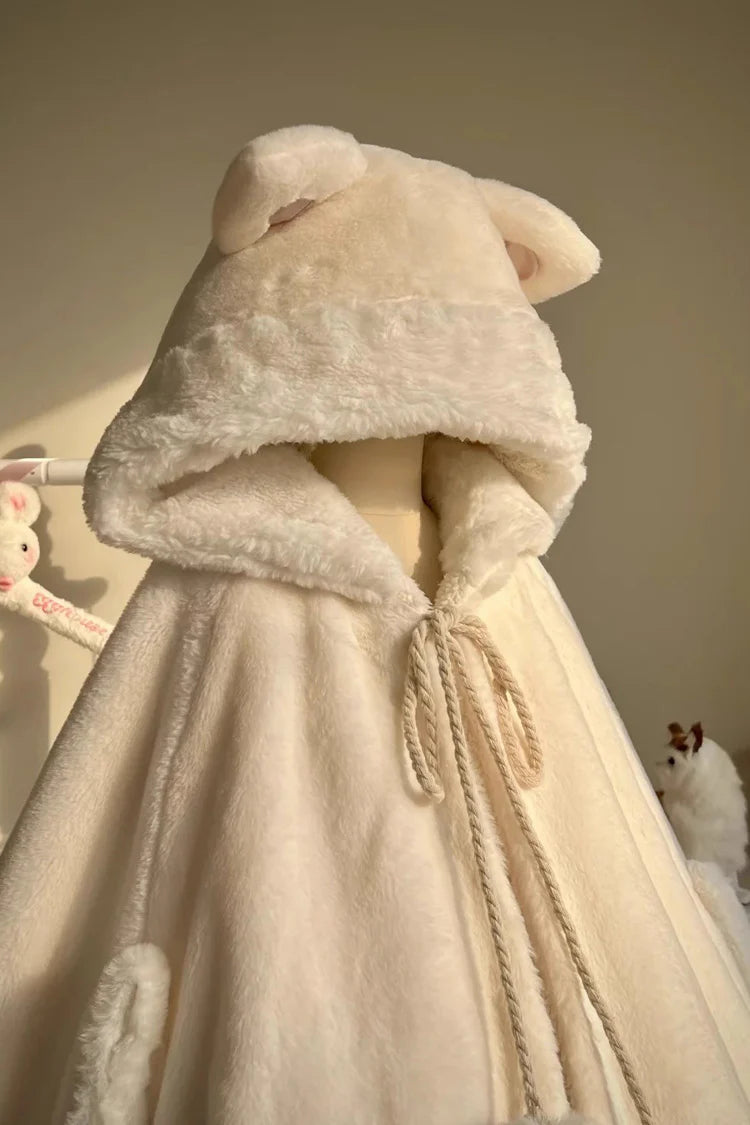 This Lolita coat in ivory features an adorable hood with kitty ears, designed in a sweet cape style. The cloak overcoat silhouette creates a soft and elegant flow, while the playful details highlight the charming Lolita aesthetic. Perfect for autumn and winter, it provides both warmth and cuteness, making it an ideal outerwear choice for pairing with Lolita dresses and accessories.
