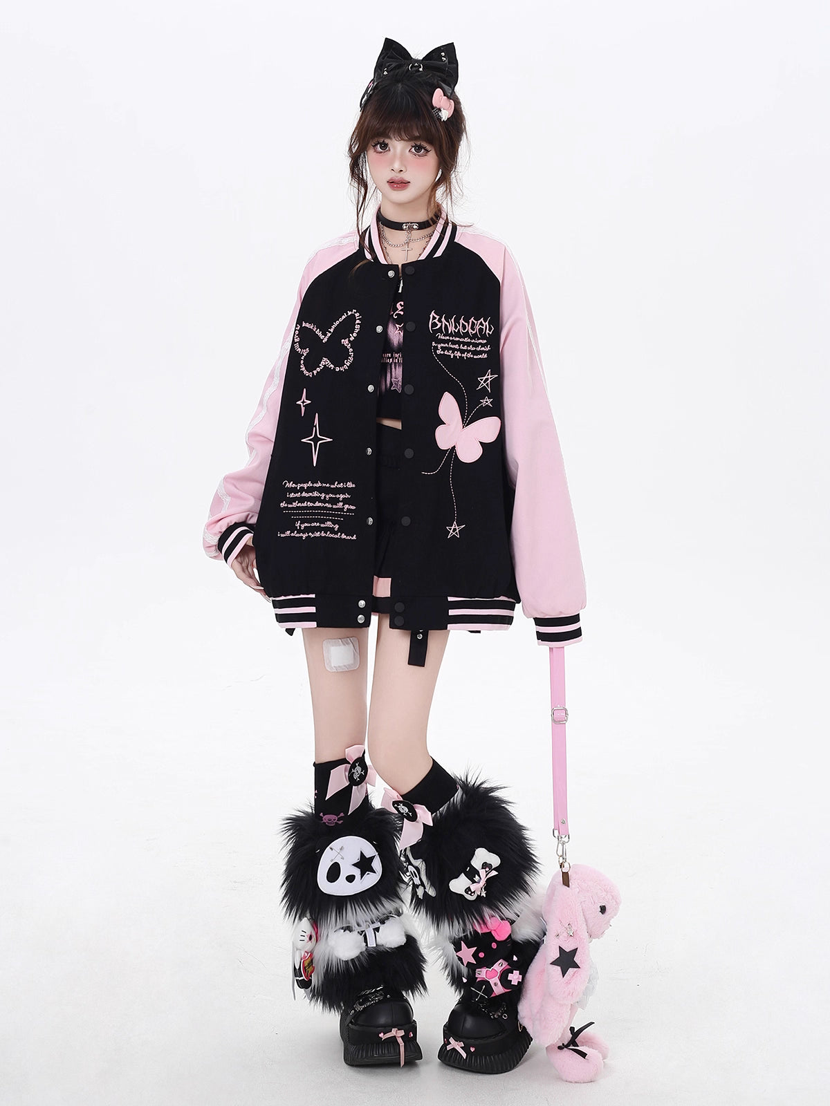 Design Concept:
This Lolita-inspired baseball jacket combines a sweet and playful aesthetic with casual comfort. Crafted in black and beige, the jacket features a subtle bow detail that adds a touch of charm to its relaxed silhouette. Perfect for spring outings, casual streetwear, or layering over cute outfits, it balances a sporty look with feminine Lolita flair. Its loose fit ensures comfort and versatility, making it an ideal choice for everyday wear or themed fashion.