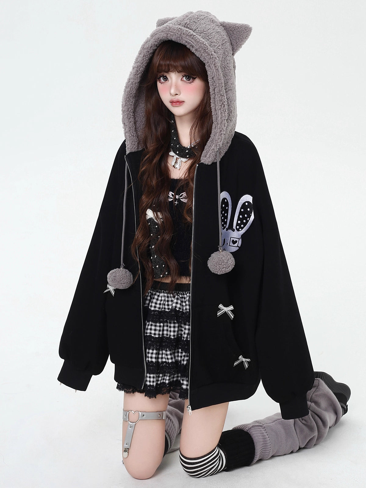 Design Concept:
This Lolita Coats fleece-lined hoodie combines playful charm with cozy warmth, crafted in black and pink with a soft, plush interior perfect for cooler days. The design features cute bunny ear accents and a relaxed loose fit, making it ideal for casual winter streetwear, daily outings, or themed photoshoots. Its sweet and youthful aesthetic pairs effortlessly with skirts, jeans, or layered outfits, offering both comfort and style for Lolita and Y2K fashion enthusiasts.