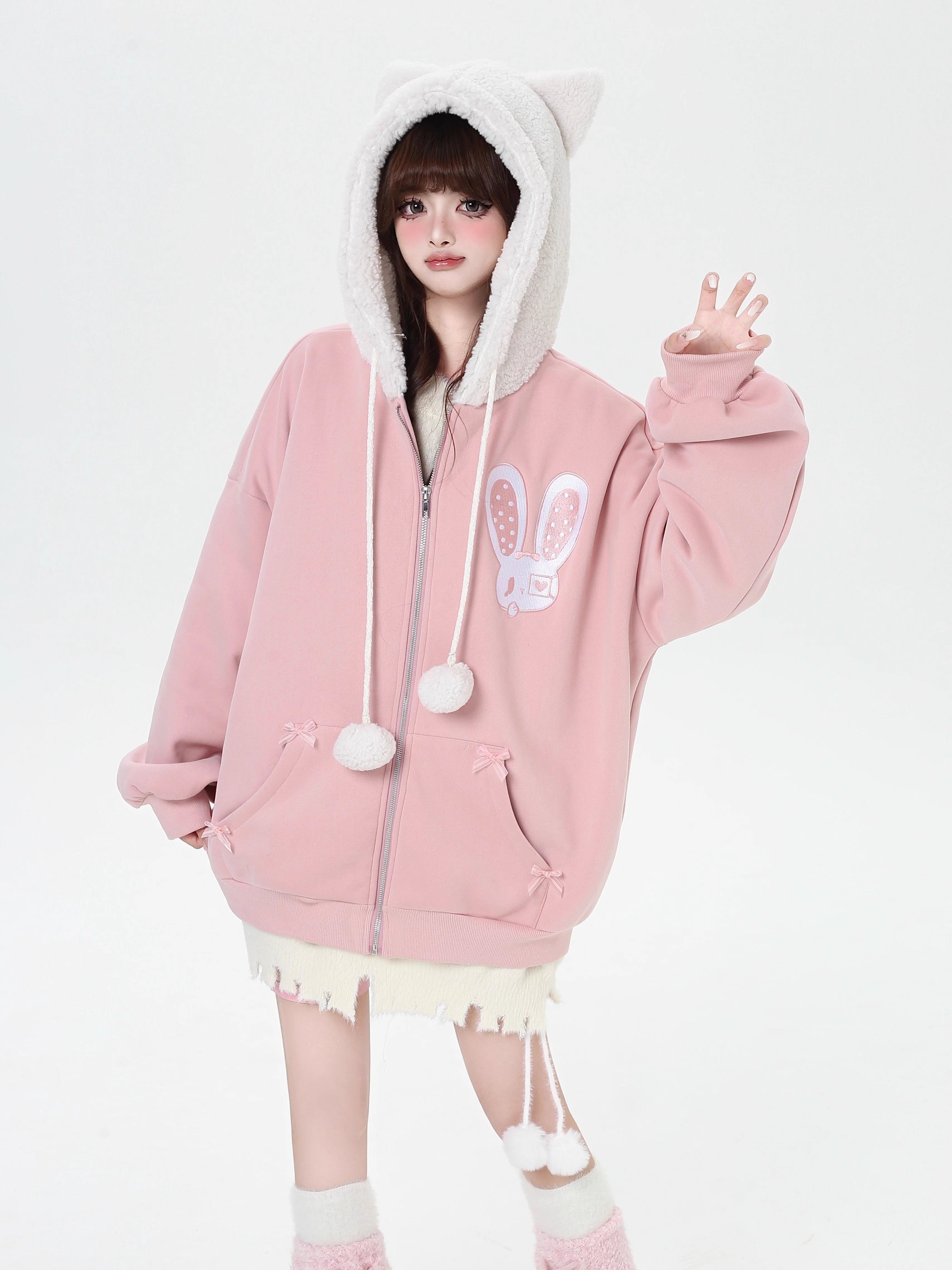 Design Concept:
This Lolita Coats fleece-lined hoodie combines playful charm with cozy warmth, crafted in black and pink with a soft, plush interior perfect for cooler days. The design features cute bunny ear accents and a relaxed loose fit, making it ideal for casual winter streetwear, daily outings, or themed photoshoots. Its sweet and youthful aesthetic pairs effortlessly with skirts, jeans, or layered outfits, offering both comfort and style for Lolita and Y2K fashion enthusiasts.