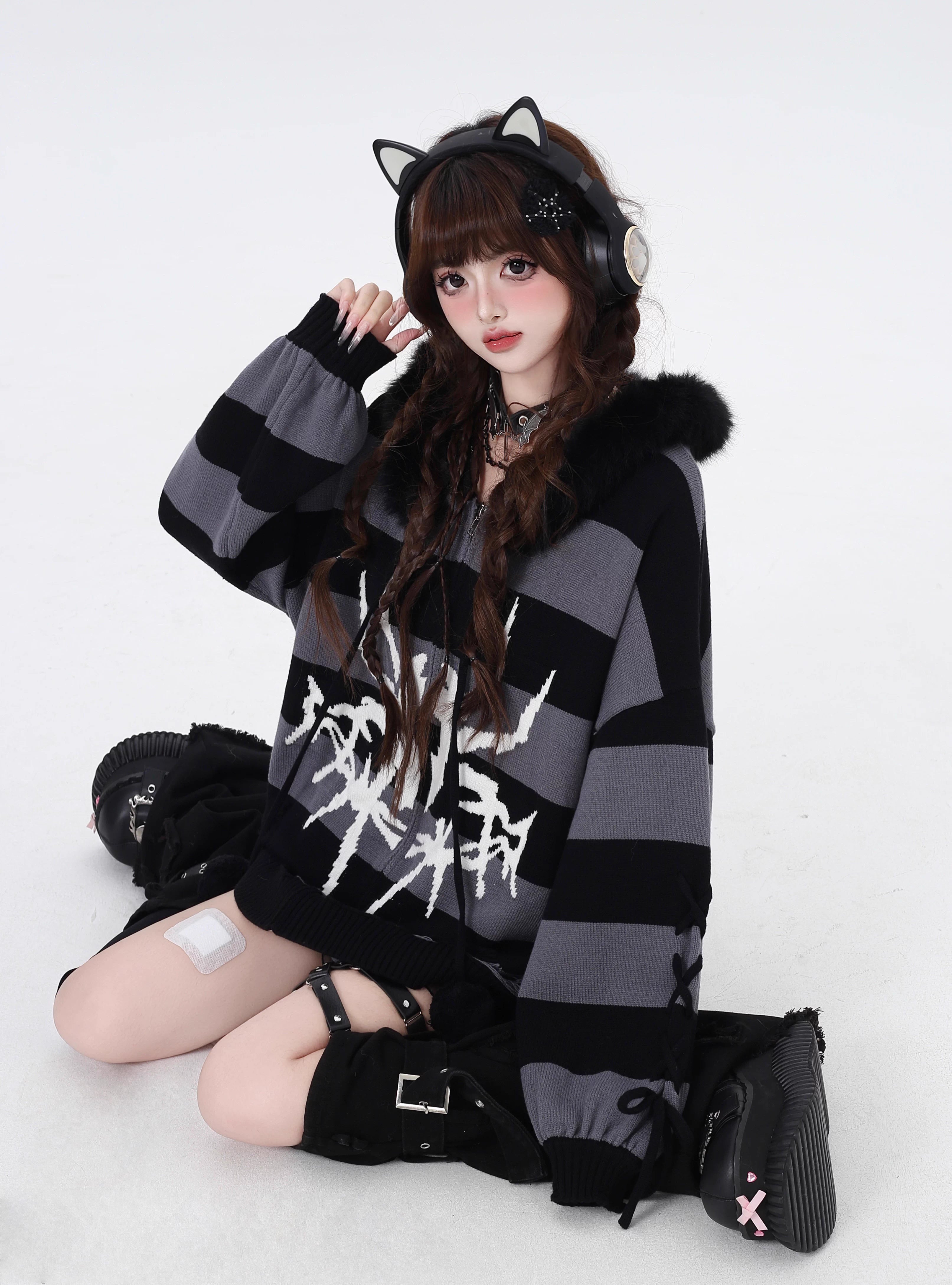Design Concept:
This Lolita coat series fuses Gothic punk style with cozy winter functionality. Designed in black with purple, white, and gray striped variations, the cardigan sweater features a detachable faux fur collar, lantern sleeves, and a loose hooded design. The detachable collar allows you to switch between a bold streetwear look and a softer, cozier winter vibe.&nbsp;Crafted from soft knit fabric, this piece ensures both comfort and warmth during colder days. Perfect for casual winter streetwear, 