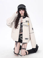 Design Concept:

Design Concept:
This Lolita coat blends retro American motorcycle style with a sweet casual touch, perfect for autumn and winter. Available in black, red, and apricot, the jacket is designed with a classic baseball silhouette that feels both vintage and versatile. The loose fit allows for comfortable layering, while the contrasting details and structured design highlight a bold, youthful streetwear aesthetic. Whether worn for daily outings or seasonal gatherings, this coat offers warmth and