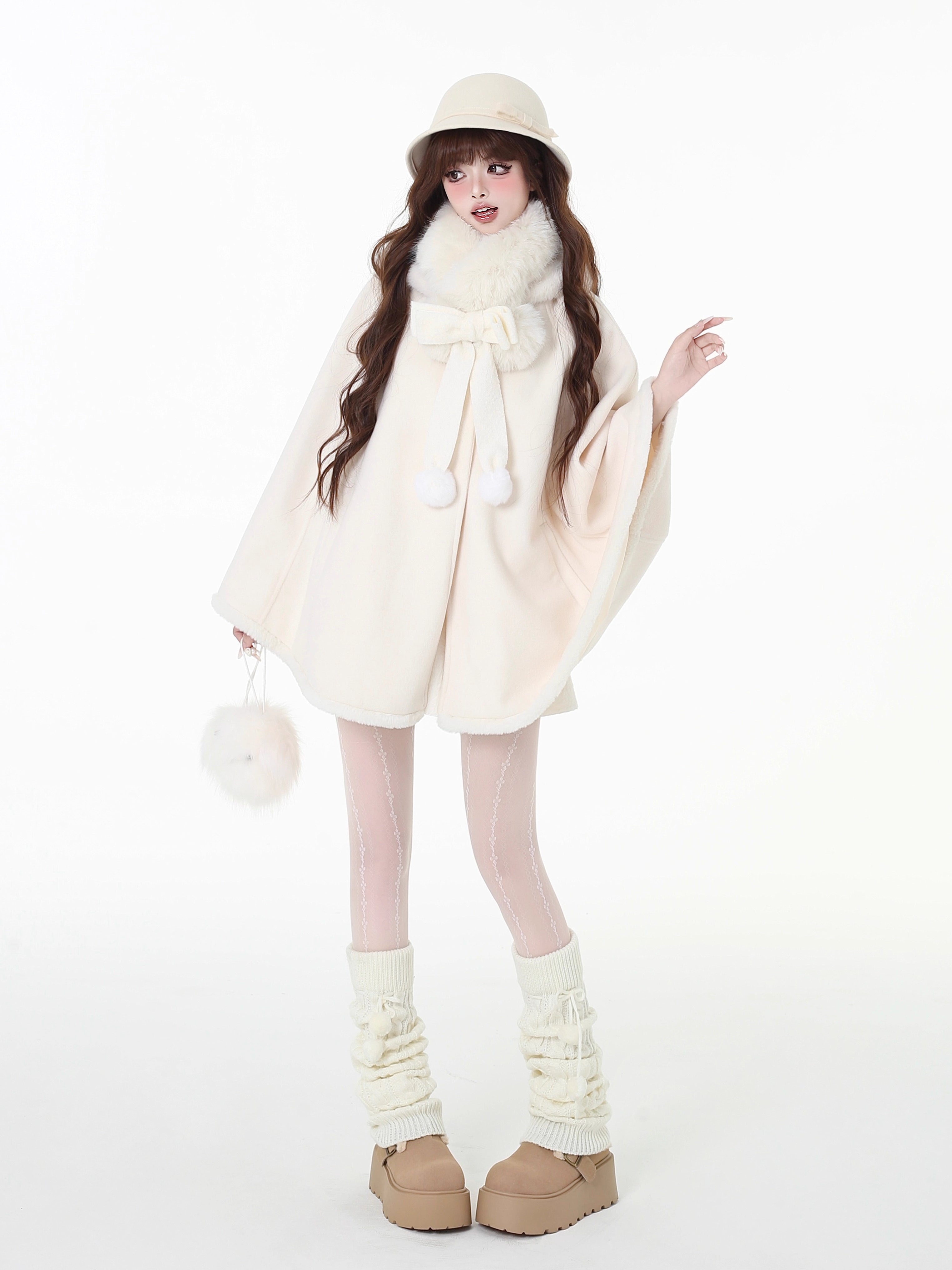Design Concept:
This Light Apricot Lolita Coat features a charming bunny ear hood design, crafted from soft, high-quality wool for cozy warmth during winter. Designed in a loose-fit cape style, it allows for comfortable layering while maintaining a cute, playful aesthetic. The coat does not include a plush scarf, but comes with a removable decorative bow, adding an extra touch of sweet elegance to your outfit. Perfect for daily wear or casual outings in the colder months.