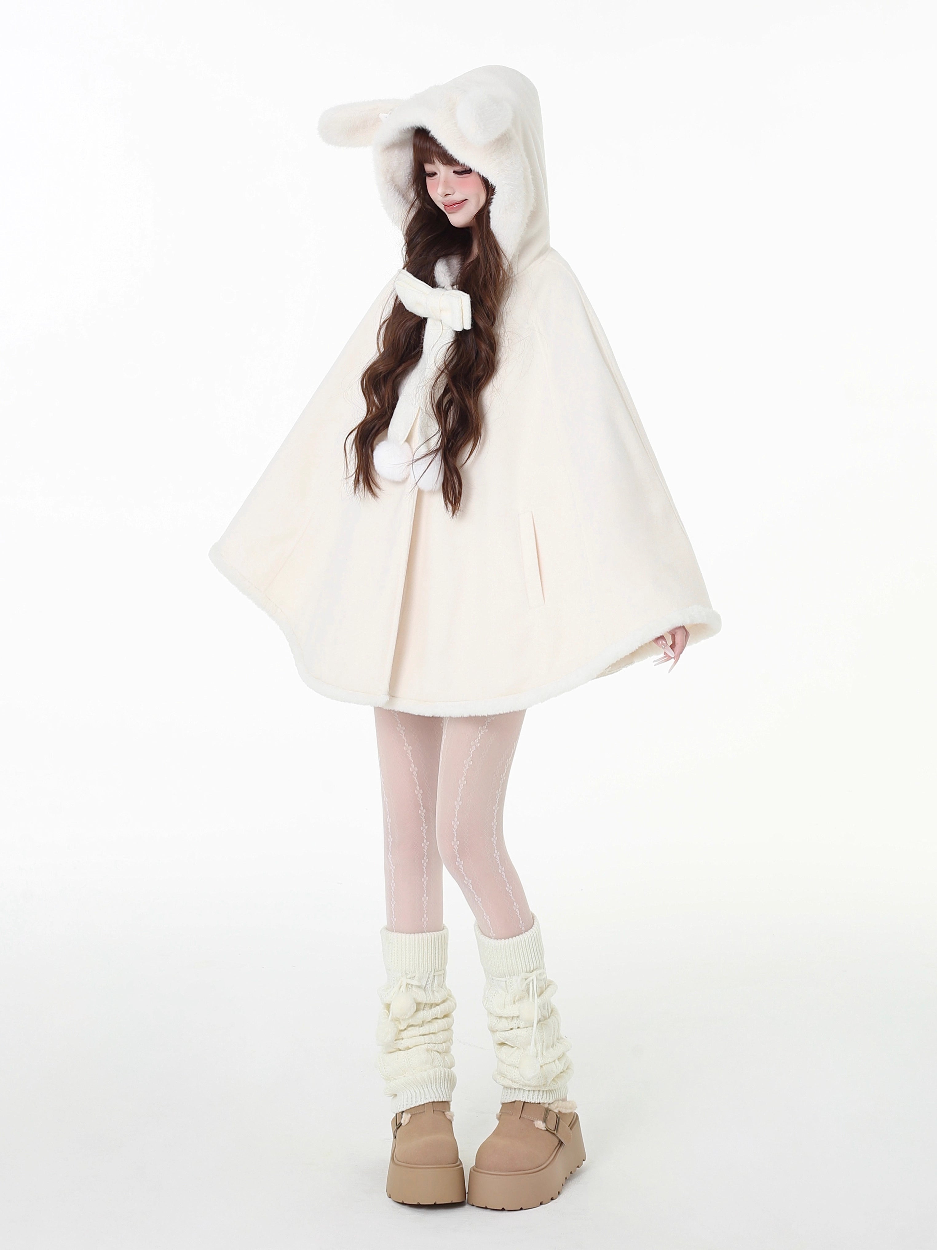 Design Concept:
This Light Apricot Lolita Coat features a charming bunny ear hood design, crafted from soft, high-quality wool for cozy warmth during winter. Designed in a loose-fit cape style, it allows for comfortable layering while maintaining a cute, playful aesthetic. The coat does not include a plush scarf, but comes with a removable decorative bow, adding an extra touch of sweet elegance to your outfit. Perfect for daily wear or casual outings in the colder months.
