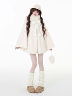 Design Concept:
This Light Apricot Lolita Coat features a charming bunny ear hood design, crafted from soft, high-quality wool for cozy warmth during winter. Designed in a loose-fit cape style, it allows for comfortable layering while maintaining a cute, playful aesthetic. The coat does not include a plush scarf, but comes with a removable decorative bow, adding an extra touch of sweet elegance to your outfit. Perfect for daily wear or casual outings in the colder months.