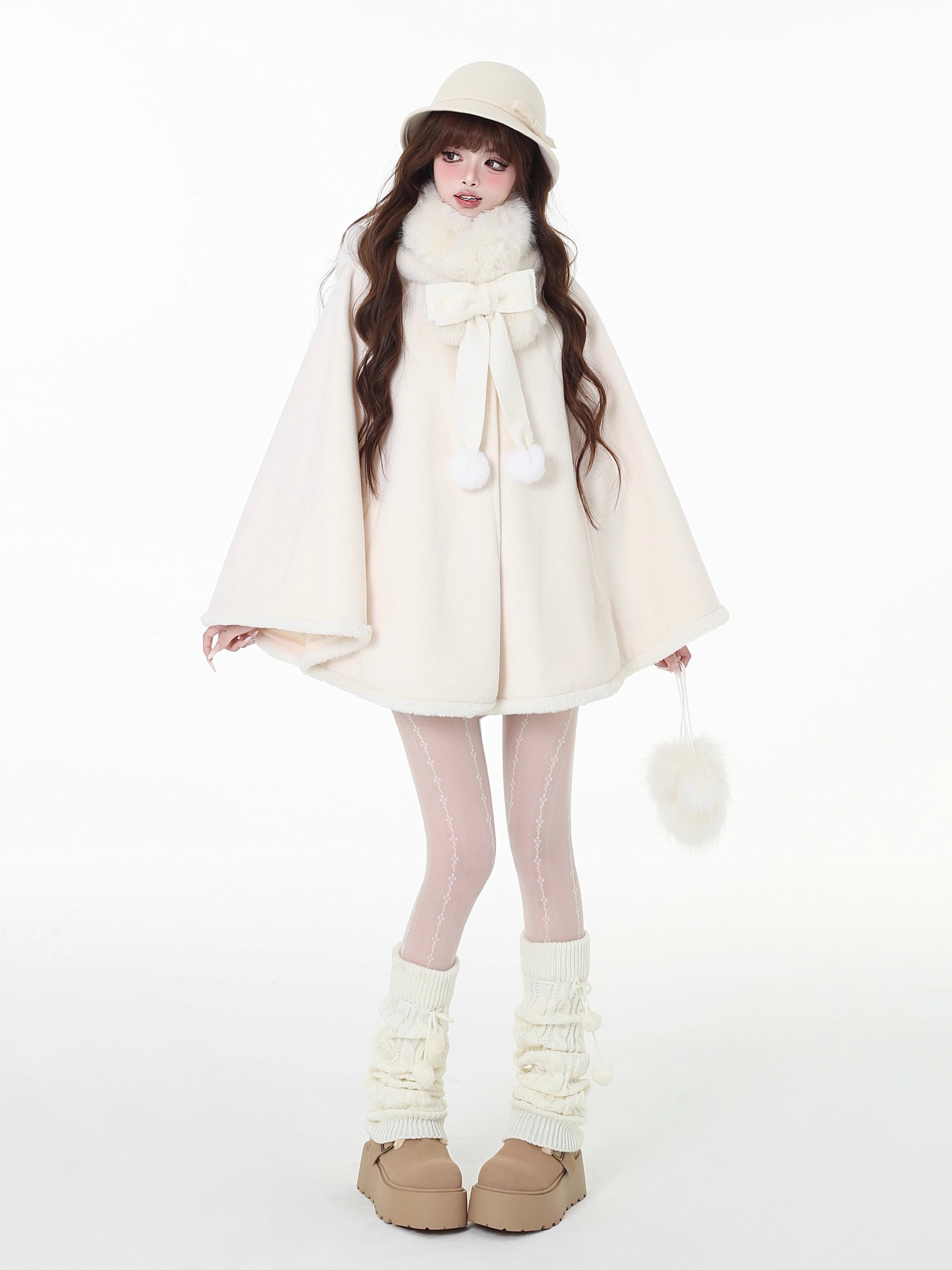Design Concept:
This Light Apricot Lolita Coat features a charming bunny ear hood design, crafted from soft, high-quality wool for cozy warmth during winter. Designed in a loose-fit cape style, it allows for comfortable layering while maintaining a cute, playful aesthetic. The coat does not include a plush scarf, but comes with a removable decorative bow, adding an extra touch of sweet elegance to your outfit. Perfect for daily wear or casual outings in the colder months.