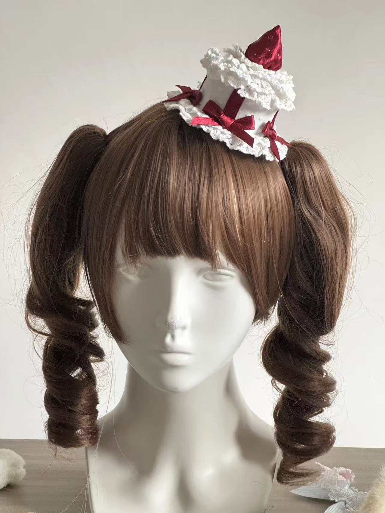 Design Concept:


This Lolita hair accessories collection features a charming lace cupcake-style mini hat adorned with strawberry details, creating a cute and playful look. Available in four color combinations—white with pink, white with red, apricot with pink, and apricot with red—each design adds a sweet and whimsical touch, perfect for enhancing Lolita outfits or cosplay styles.