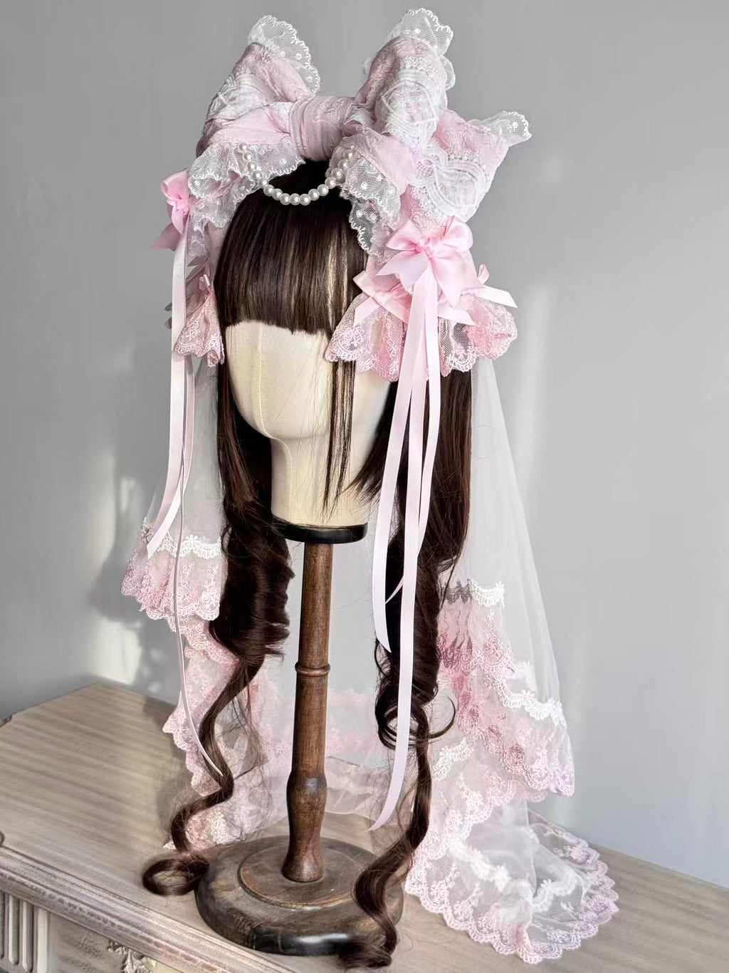 Design Concept:


This Lolita hair accessories set includes a delicate bowknot hair clip (KC) paired with a soft matching veil, creating an elegant and dreamy style. Available in three colors—white, pink, and blue—each design captures a sweet and graceful charm, making it a versatile choice for coordinating with different Lolita outfits.