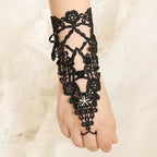 Elevate your Gothic Lolita style with this black vintage-inspired lace floral ring bracelet. Designed with intricate lace and delicate flower accents, it exudes both elegance and mystery. The connected ring and bracelet design creates a dramatic, graceful silhouette that enhances any outfit. Perfect for tea parties, cosplay, stage performances, or daily coordinates, this accessory adds a timeless Gothic charm and refined femininity to your look.