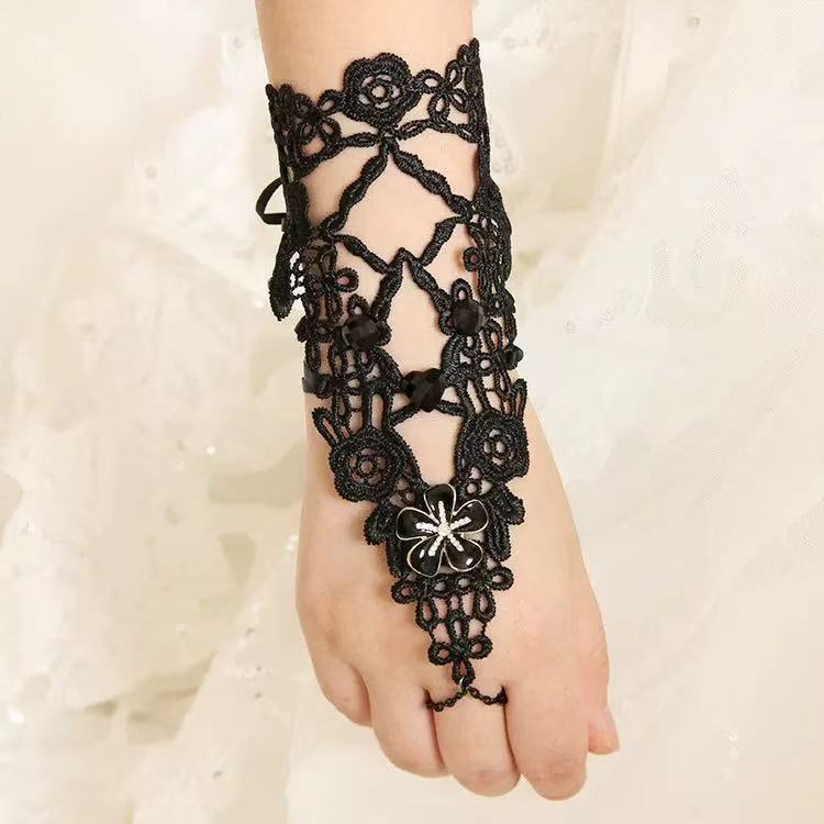 Elevate your Gothic Lolita style with this black vintage-inspired lace floral ring bracelet. Designed with intricate lace and delicate flower accents, it exudes both elegance and mystery. The connected ring and bracelet design creates a dramatic, graceful silhouette that enhances any outfit. Perfect for tea parties, cosplay, stage performances, or daily coordinates, this accessory adds a timeless Gothic charm and refined femininity to your look.