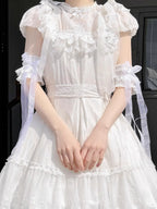 These Lolita hand accessories feature delicate lace with charming bow details, designed in both white and black versions. Perfect for LO-style outfits and cosplay, these arm sleeves add a sweet and elegant touch to your ensemble. Crafted with attention to detail, they are comfortable to wear and versatile for pairing with dresses, blouses, or other Lolita accessories. Each pair enhances the feminine and whimsical aesthetic of your Lolita wardrobe.