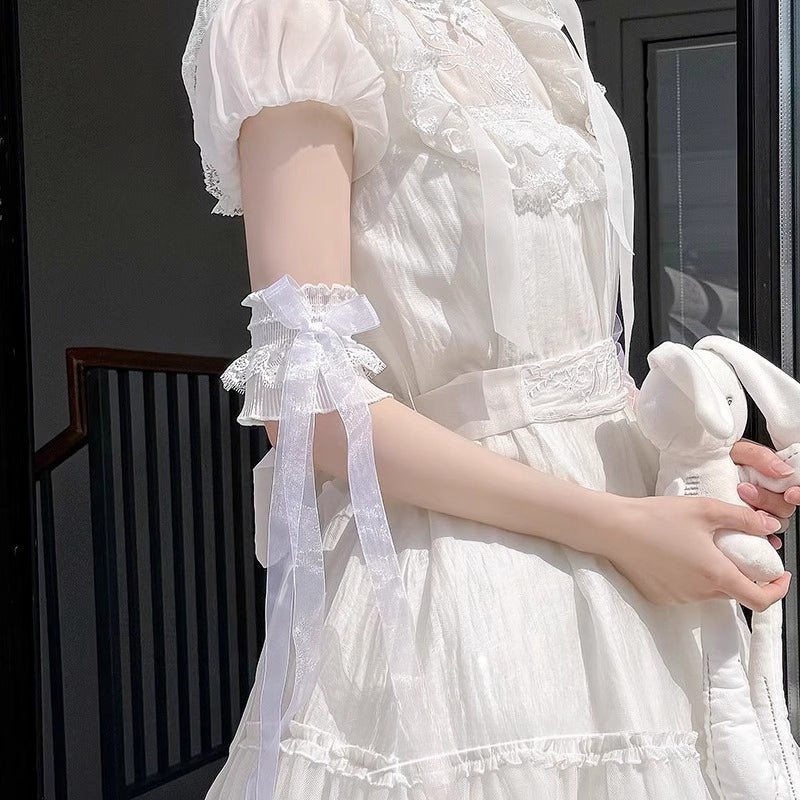 These Lolita hand accessories feature delicate lace with charming bow details, designed in both white and black versions. Perfect for LO-style outfits and cosplay, these arm sleeves add a sweet and elegant touch to your ensemble. Crafted with attention to detail, they are comfortable to wear and versatile for pairing with dresses, blouses, or other Lolita accessories. Each pair enhances the feminine and whimsical aesthetic of your Lolita wardrobe.