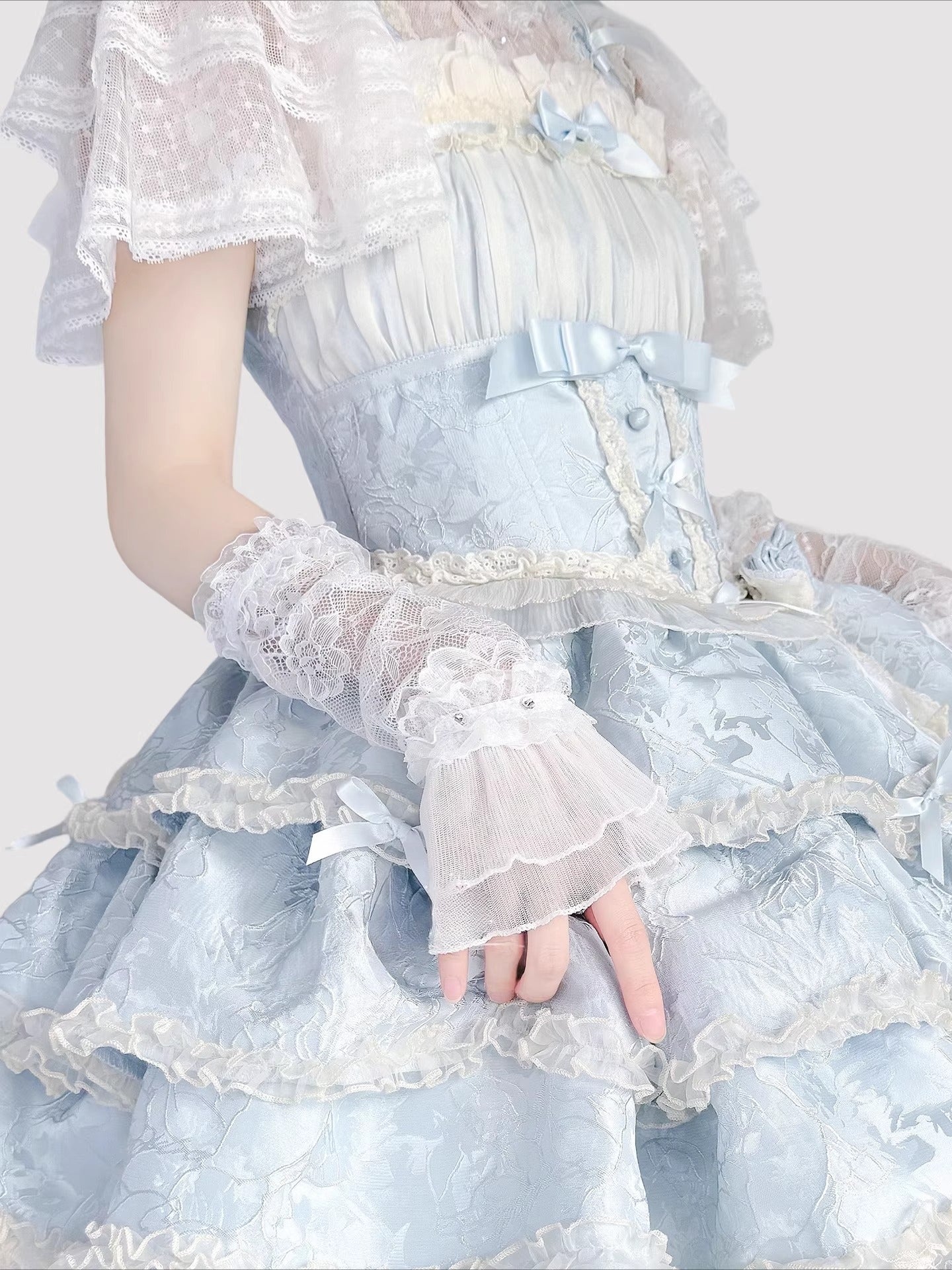 Product Description:
These Lolita hand accessories feature delicate lace with sparkling crystal details, designed in both white and black versions. The white style evokes a dreamy bridal elegance, perfect for weddings, fairy cosplay, and pure sweet looks. The black style adds a gothic charm, making it suitable for dark Lolita outfits and dramatic cosplay themes. Each pair comes as two sleeves, crafted with long lace edges that bring out an elegant, refined aesthetic.