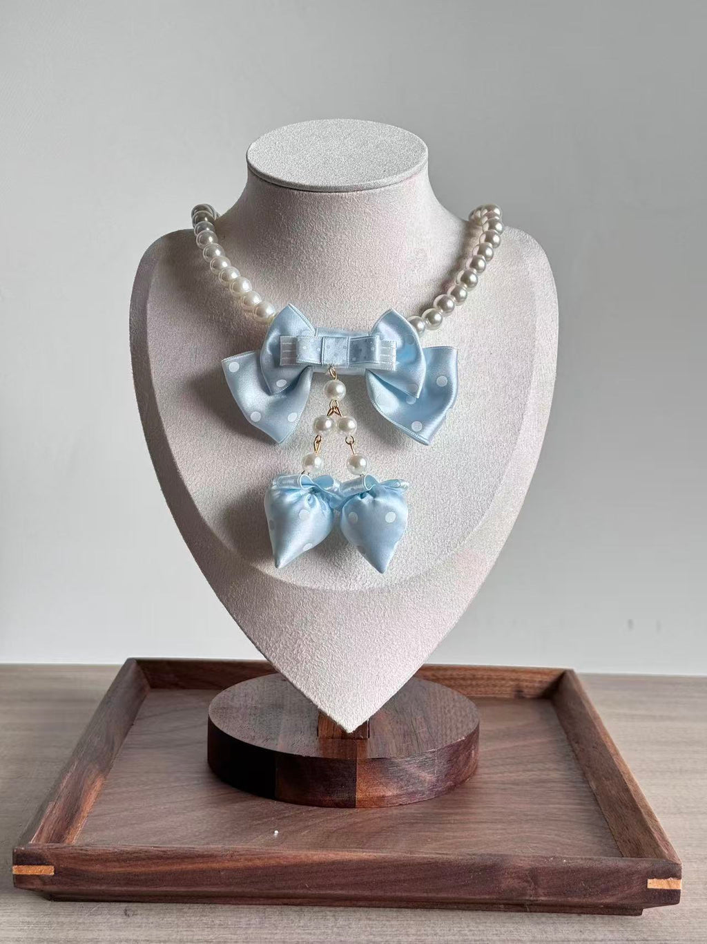 Design Concept:


This Lolita necklace collection features four charming styles, each adorned with a playful strawberry pendant and delicate pearl accents. Available in red polka dots, wine red polka dots, pink polka dots, and blue polka dots, these necklaces bring a sweet and versatile touch to daily outfits while capturing the whimsical essence of Lolita fashion.