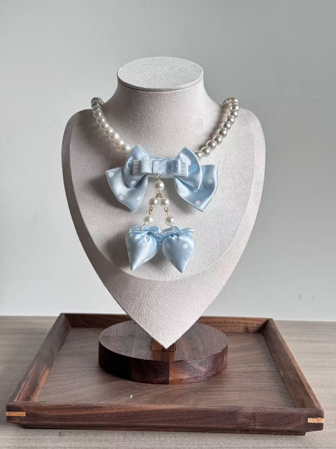 Design Concept:


This Lolita necklace collection features four charming styles, each adorned with a playful strawberry pendant and delicate pearl accents. Available in red polka dots, wine red polka dots, pink polka dots, and blue polka dots, these necklaces bring a sweet and versatile touch to daily outfits while capturing the whimsical essence of Lolita fashion.