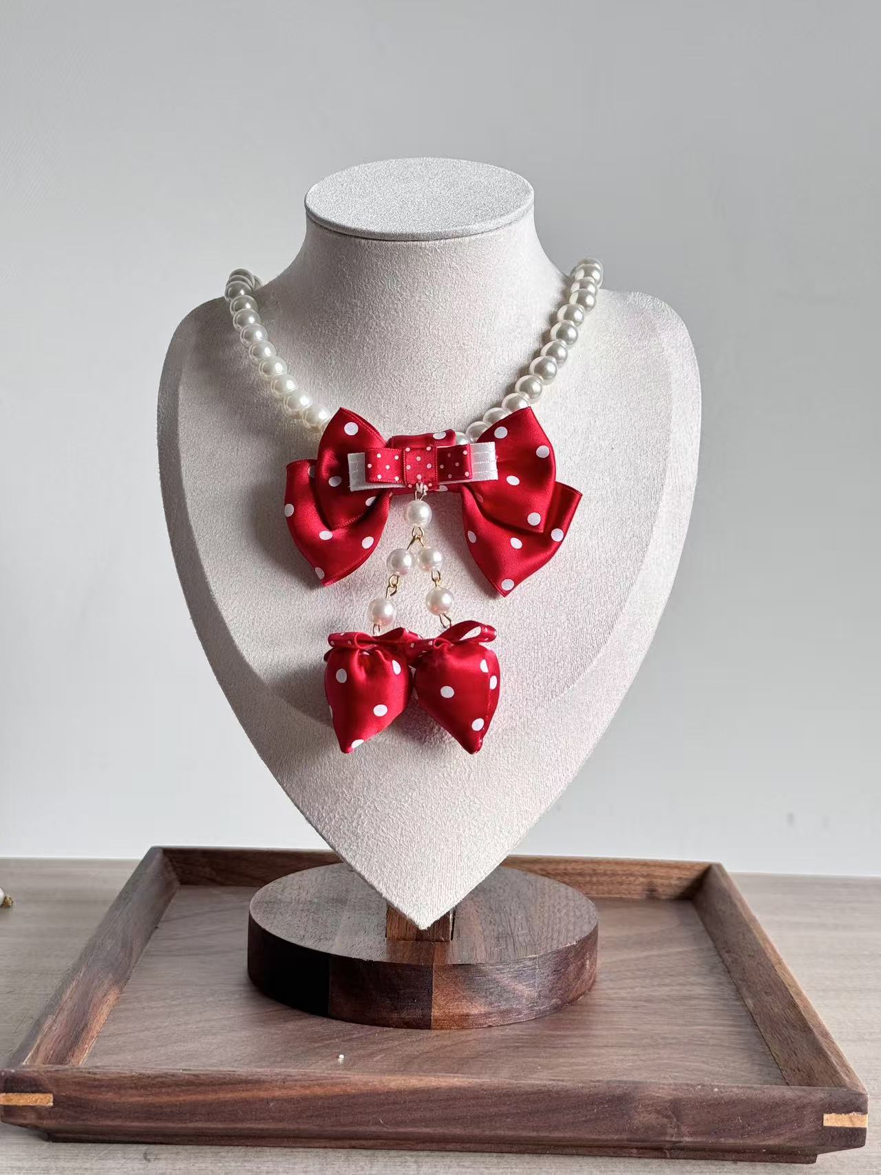 Design Concept:


This Lolita necklace collection features four charming styles, each adorned with a playful strawberry pendant and delicate pearl accents. Available in red polka dots, wine red polka dots, pink polka dots, and blue polka dots, these necklaces bring a sweet and versatile touch to daily outfits while capturing the whimsical essence of Lolita fashion.