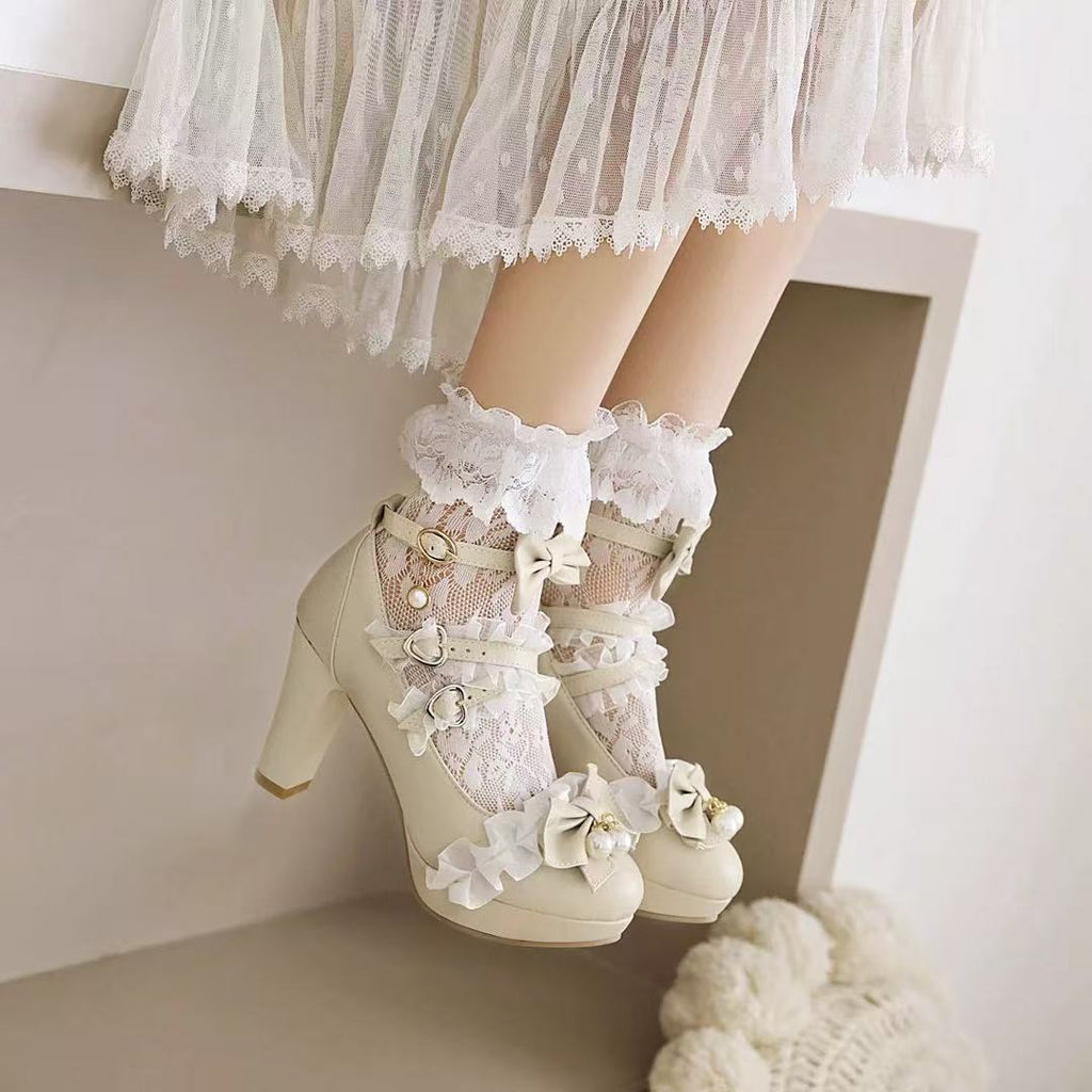 Design Concept:

These charming Lolita shoes are crafted to combine elegance and playful princess-inspired charm. Made from high-quality materials, each pair features delicate lace detailing and a sweet ribbon accent on the front, adding a feminine touch. Designed with a rounded toe and an 8cm sturdy heel, they provide both height and stability while ensuring comfort for extended wear. Perfect for daily Lolita outfits, tea parties, or special occasions. Available in four versatile colors—black, white, beige